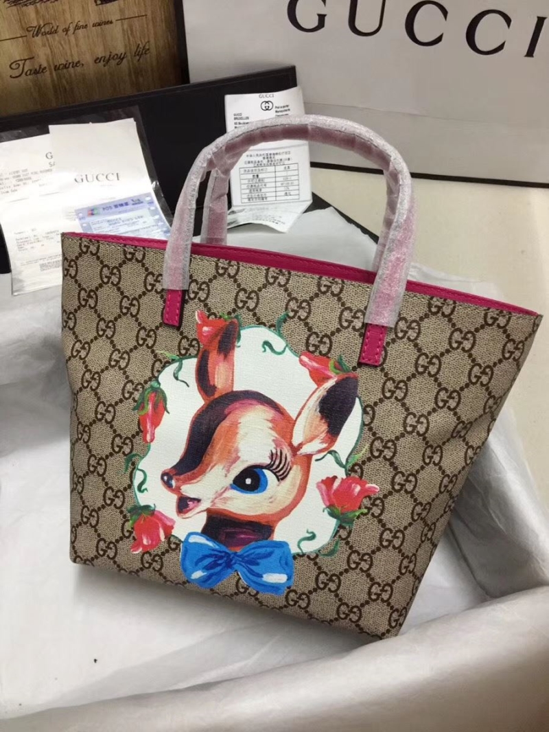 G*u*i shopping bags